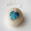 Christmas Snowflake Heart Pendant In Teal Blue