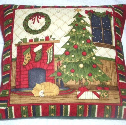 Ginger Kitten Under Christmas Tree By The Fireplace Cushion